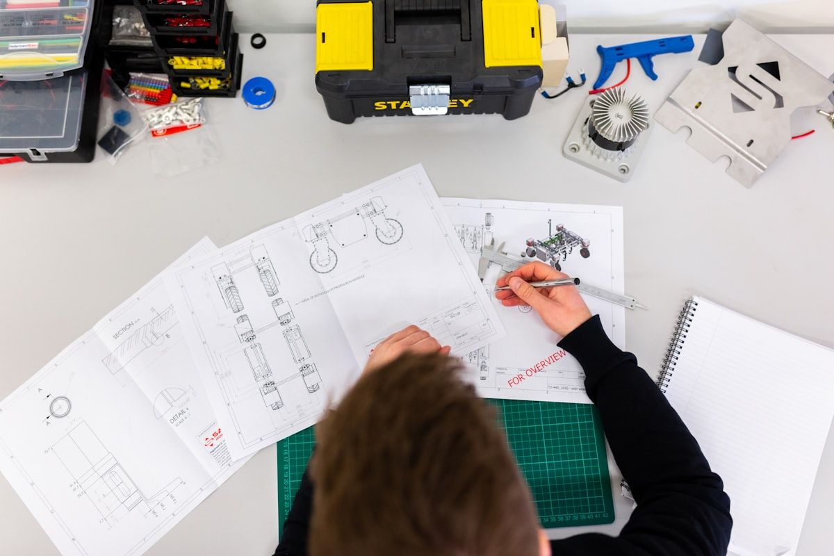 Property manager reviewing building drawings
